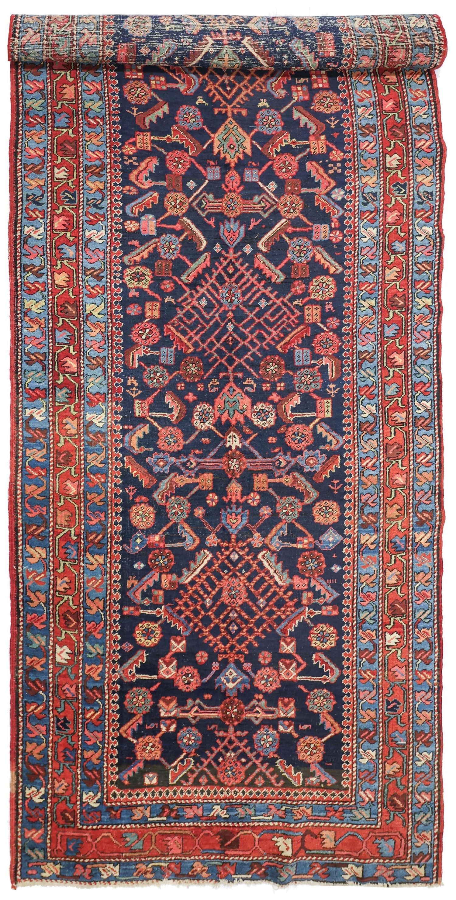 Antique Heriz handwoven tribal rug J76483: richly colored, detailed design.
