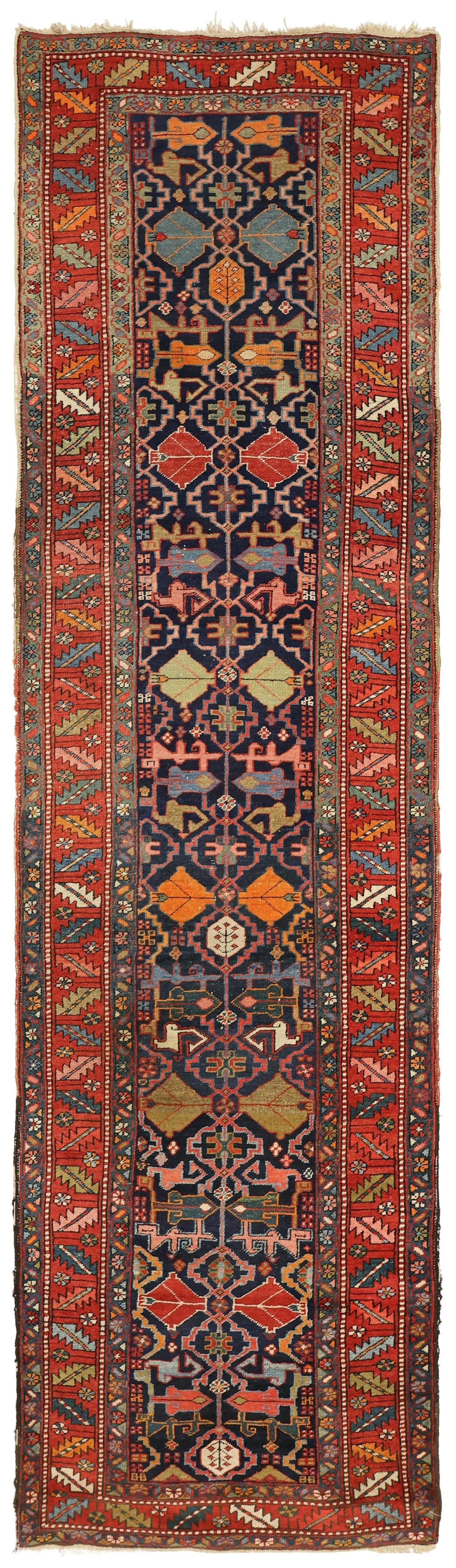 Antique Heriz handwoven tribal rug, J76372: rich red, navy, and multicolor design.
