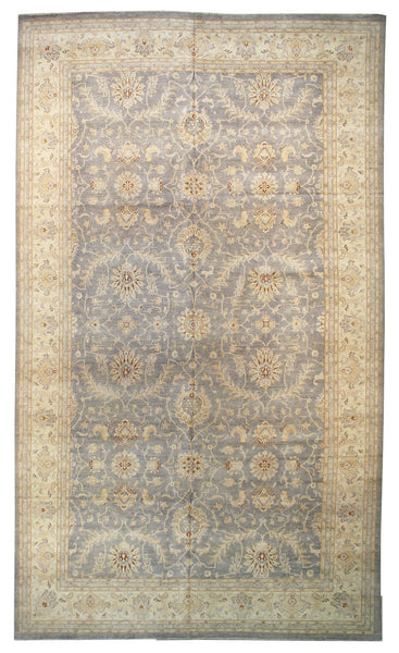 Agra Handwoven Traditional Rug J50711: Elegant gray and beige handwoven rug with intricate floral pattern.
