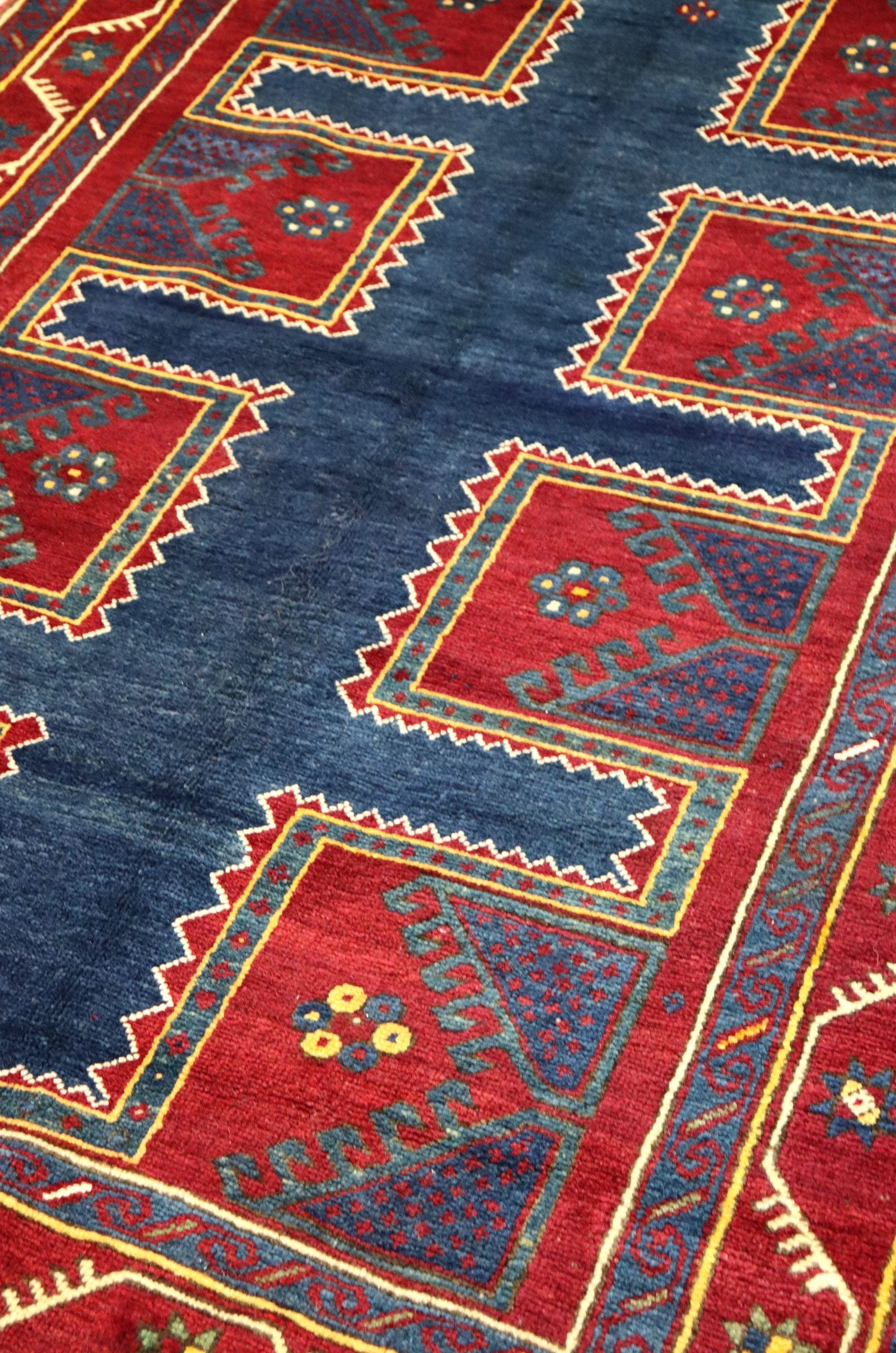 https://www.landryandarcari.com/cdn/shop/products/tribal-kazak-rug-j65238-a_2048x.jpg?v=1653338914